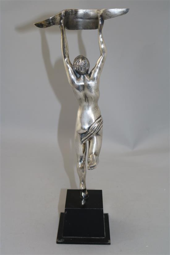 A French silvered bronze advertising figure of a winning athlete, height 17in.